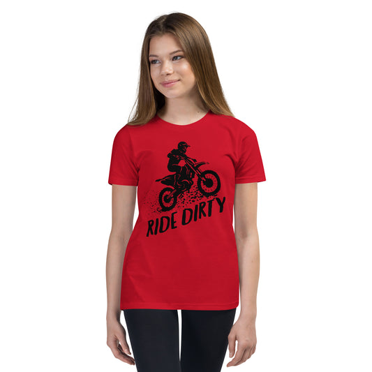 Child wearing a red short-sleeve shirt with black dirt bike graphic and 'Ride Dirty' text