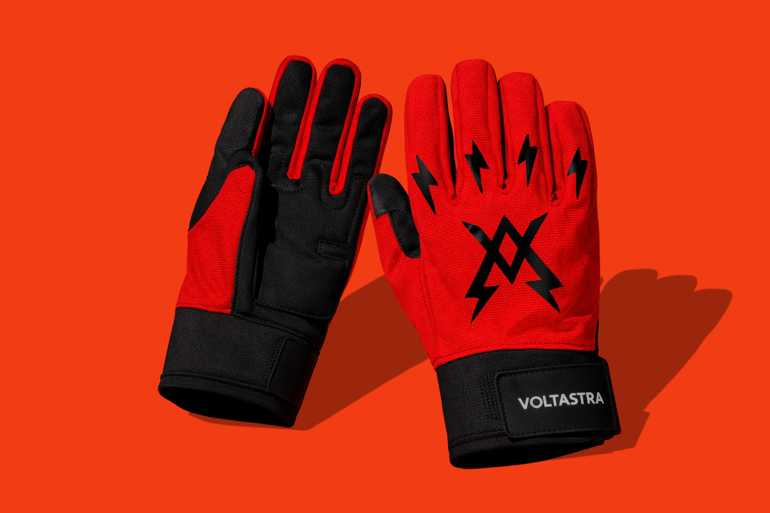 Voltastra OG black and red gloves with branding on a solid background
