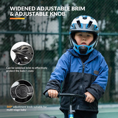 Child wearing a blue helmet with widened adjustable brim and adjustable knob features, standing on a bicycle.